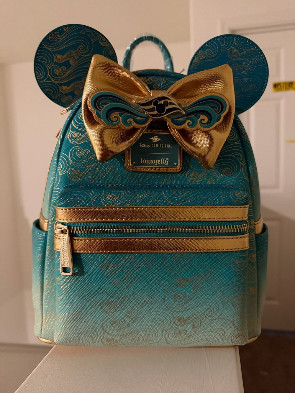 Loungefly Teal and Gold Wave Bow Mini Backpack
